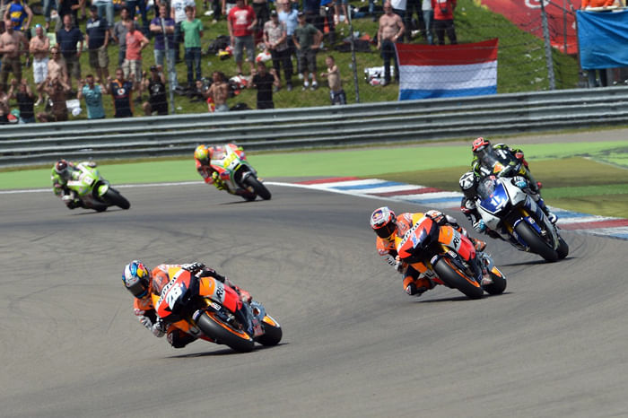 Stoner wins as Lorenzo crashes